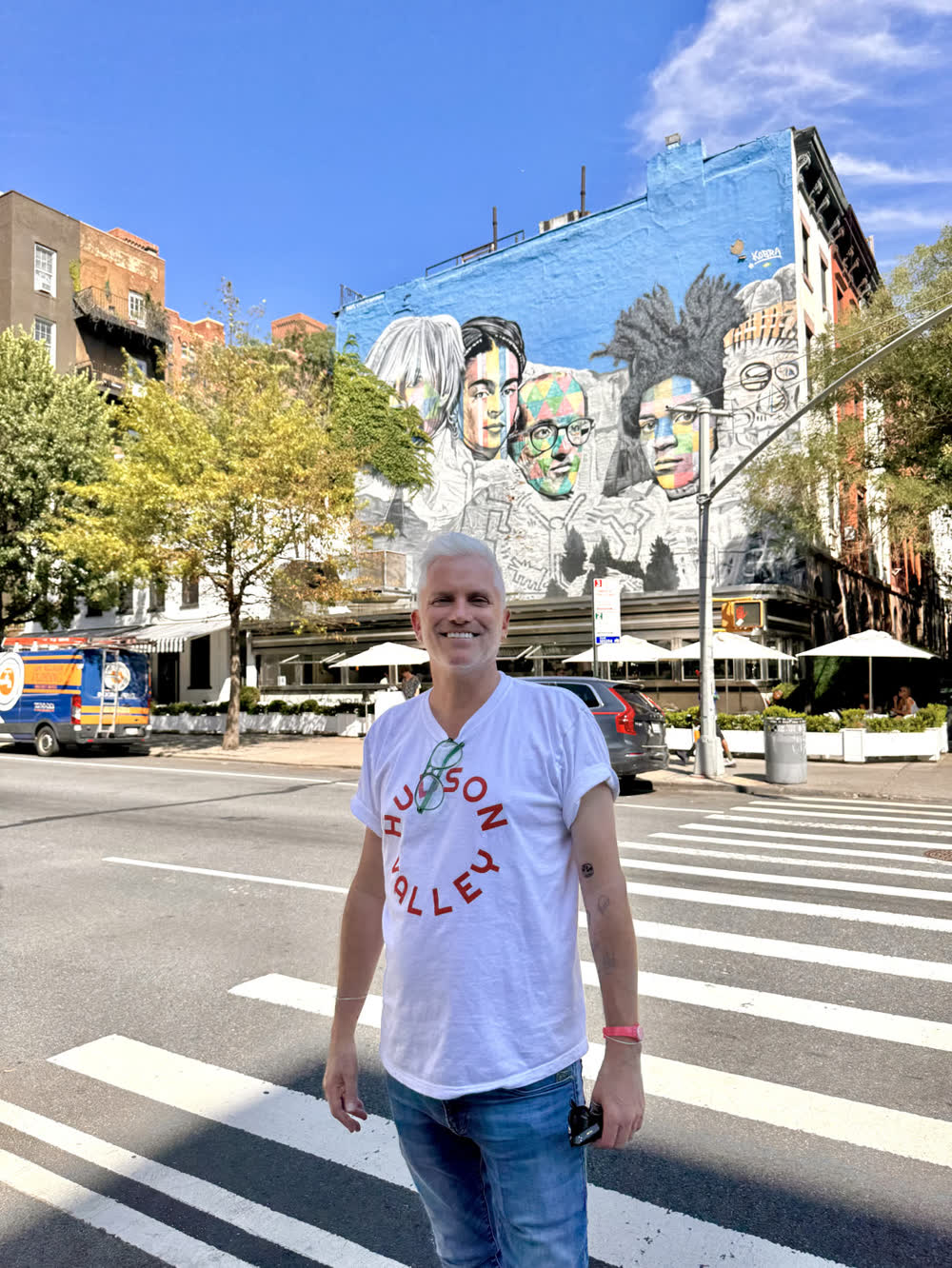Pim Zeegers in front of a Bushwick mural in New York